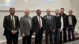 Group photo featuring Mr. Mayank Goel, Dean Jukka Riekki, Ambassador Hemant H. Kotalwar, Vice Rector Arto Maaninen, Dr. Jari Juuti, Professor Matti Latva-Aho, and Professor Timo Rahkonen at the University of Oulu.