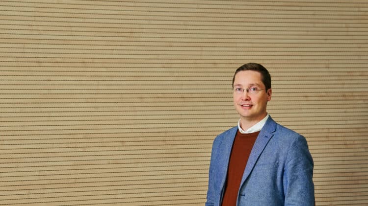 Lauri Lovén, Director of the Future Computing Group and strategic research area coordinator at 6G Flagship, University of Oulu, standing against a neutral background.