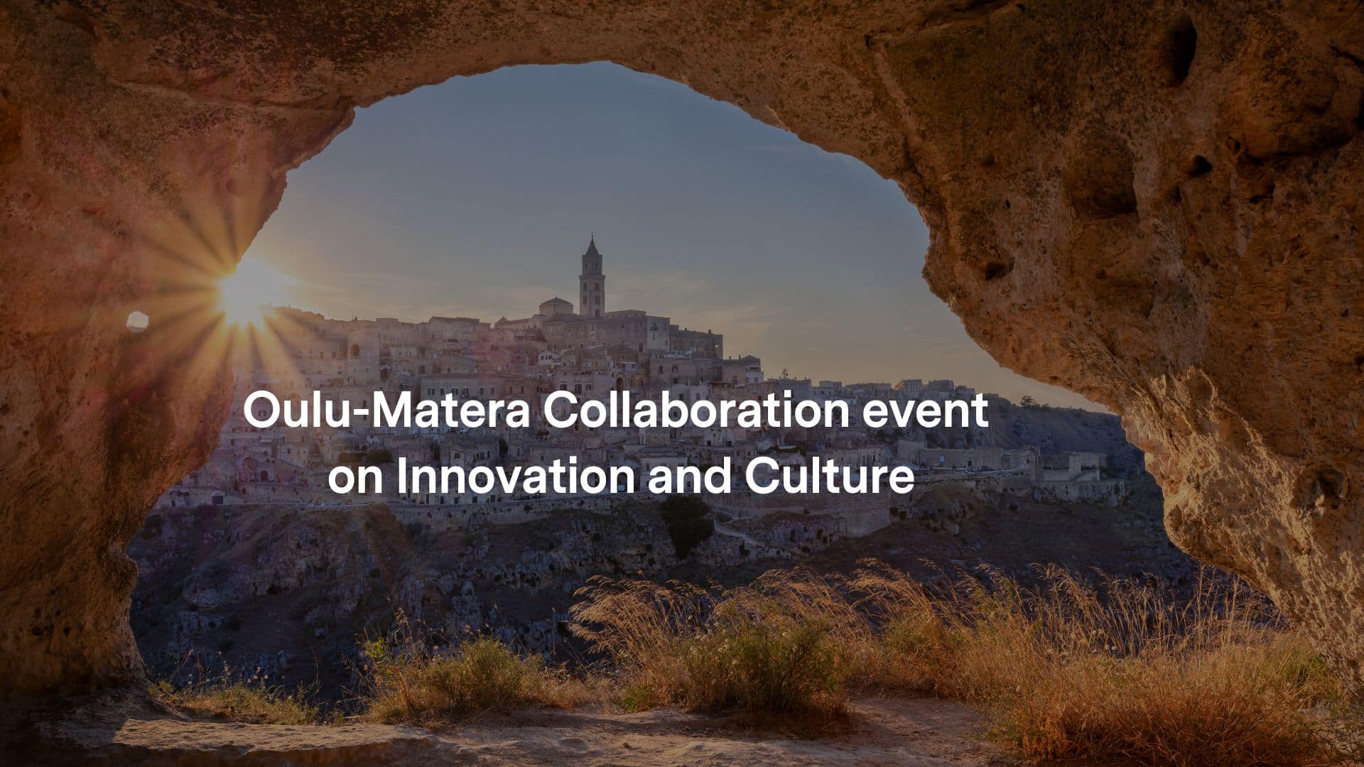 View of Matera, Italy, through a cave opening at sunrise with text reading “Oulu-Matera Collaboration event on Innovation and Culture.